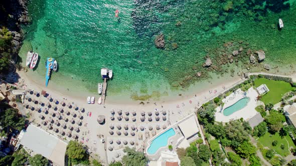 Aerial View to Clear Blue Sea Water with Moored Boats Near Private Beach alt