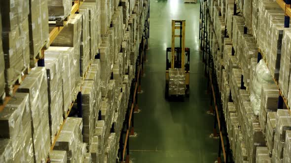 Forklift To Logistics Warehouse. Logistics Forklift Warehouse and Pallets