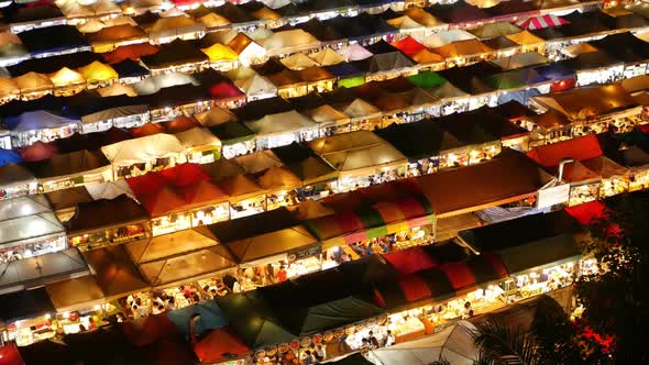 Illuminated Tents of Market at Night. Top View of Colorfull Brightly Illuminated Tents of Ratchada alt