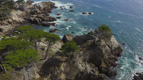 Slow Aerial Tilt Down of the Rocky Shores of Big Sur Coast in California alt