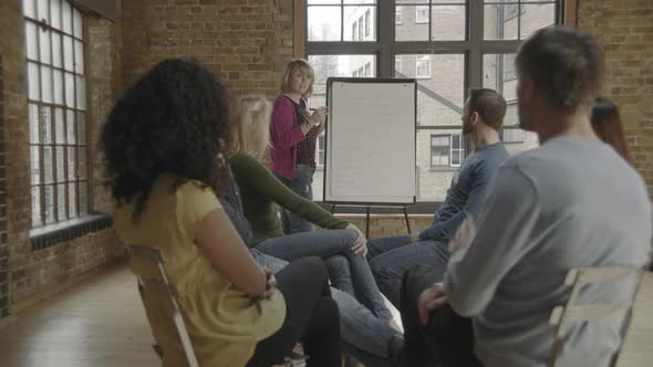 Group in workshop looking at whiteboard