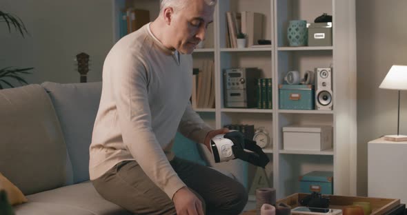 Man experiencing virtual reality at home