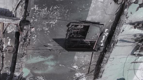 Vertical Video of a Multistorey Building Destroyed During the War in Ukraine alt