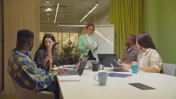 Furious Female Boss Disappointed By Employee Work alt