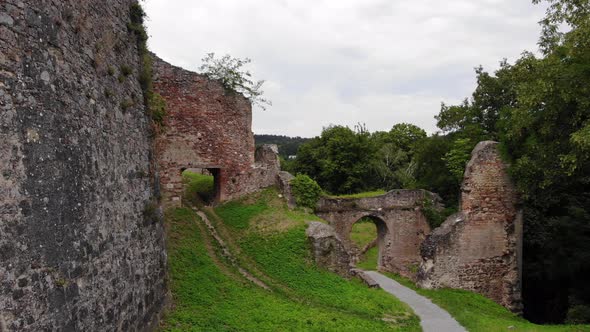 Arches and trails near the ancient castle, European travel, tourist destinations