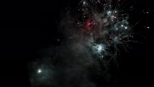 Real Fireworks Background Shining Fireworks with Bokeh Lights in the Night Sky alt