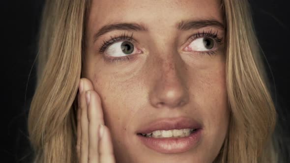 Slow motion shot of woman covering face in shame alt