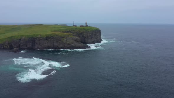 Aerial View of Shikotan Island. Shpanberg Lighthouse on Cape. Lesser Kuril Chain, Russia.