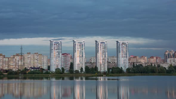 Tall Houses Of A Big City Near The River, Time Lapse