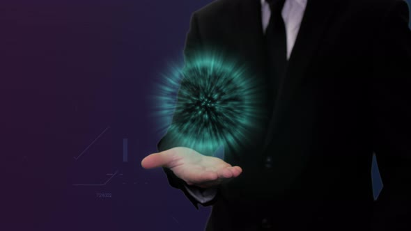 Man In Black Suit With Blue Digital Energy Above Hand 