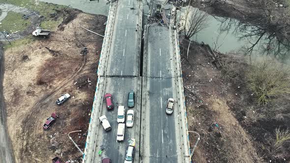 Destroyed Bridge In Irpen City. Bombed City In Ukraine. Blown Up Cars