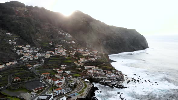 Flying Forwards over Porto Moniz Town, Madeira Island, Portugal