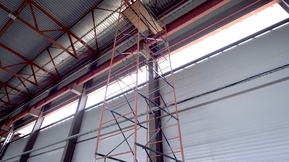 Ceiling Industrial Hangar or Warehouse. High Ceiling, Serious Metal Construction. The Build alt