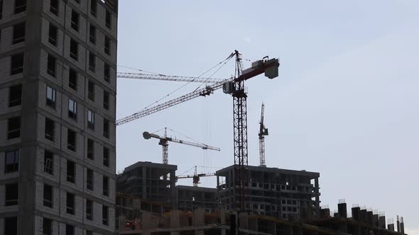 Construction Crane Moves Cargo