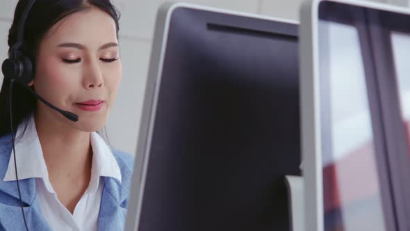Customer Support Agent or Call Center with Headset Talking to Customer on Phone alt
