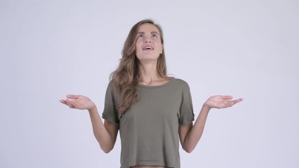 Happy Young Beautiful Woman Catching Something alt