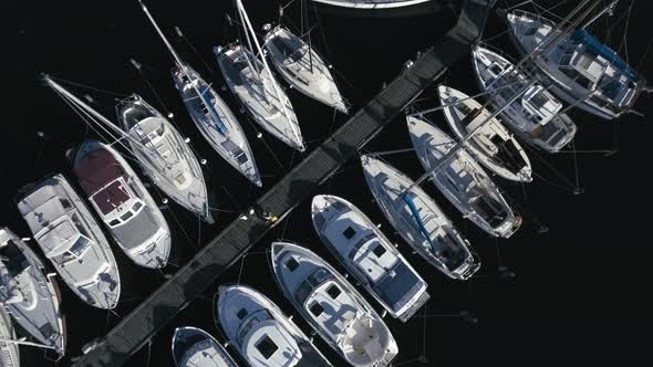 Drone Flies Over Sailboats In Bird's Eye View