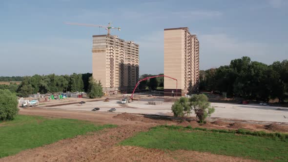 Aerial View  Road Construction Site and a Big Pump for Concrete Pouring Road alt