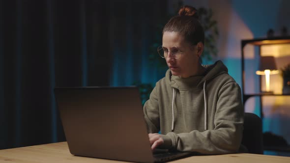 Woman Working on Laptop