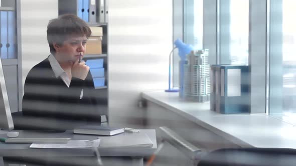 Stressed Middle Aged Businesswoman alt