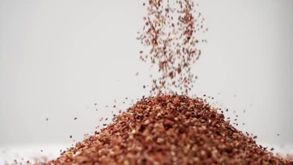 Coarse Sand Pouring In Slow Motion