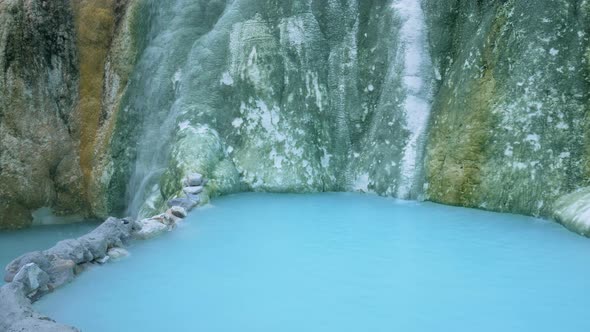 Geothermal pool and hot spring in Tuscany, Italy. Bagni San Filippo natural thermal waterfall in the alt