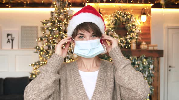 Wearing Protecting Mask during the Coronavirus Pandemic at Christmas Eve
