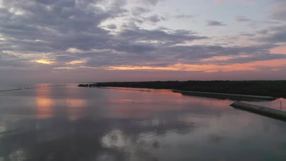 Aerial view of Bang Pra Reservoir dam. National park with reflection of river lake, mountain alt