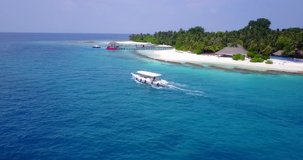 Daytime birds eye copy space shot of a summer white paradise sand beach and turquoise sea background alt