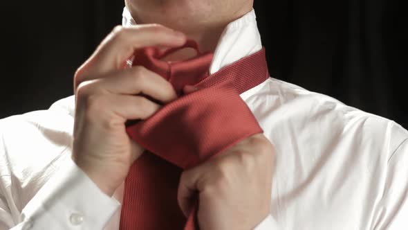 Tie dressing by anonymous businessman studio
