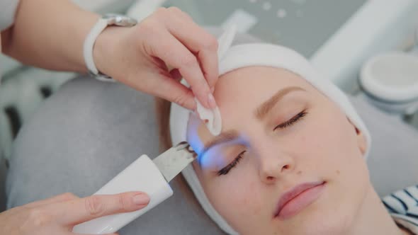 Close-up Shot of Cosmetician Making Cavitation Facial Peeling alt