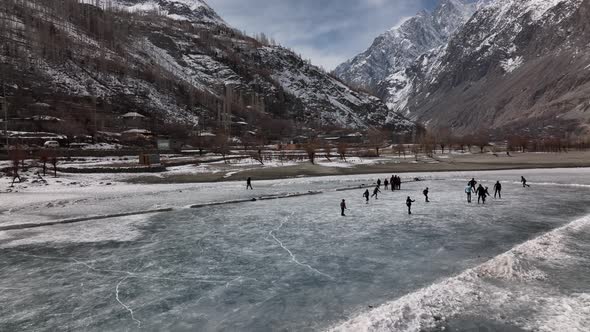 Landscape of lake with mountains. Khalti Lake Gilgit Northern Area of Pakistan winter. alt
