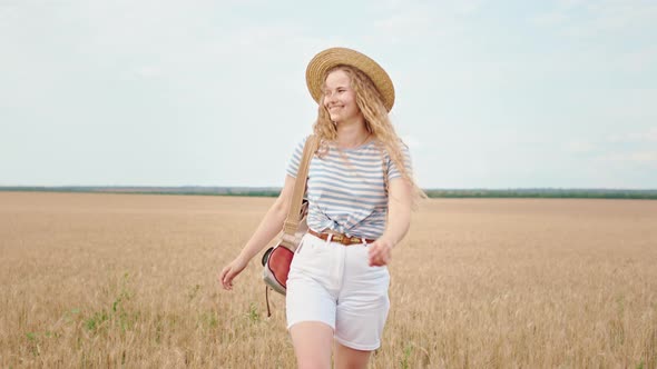 In Front of the Camera Walking Lady with a Large alt