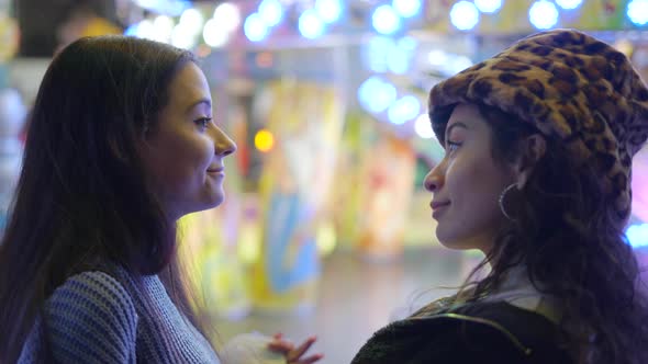 Two Beautiful Girls Looking at Each Other Nodding with Happy Face Expression Agree on Riding alt