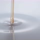 Pouring oil into milk and making splash. Slow Motion. - VideoHive Item for Sale