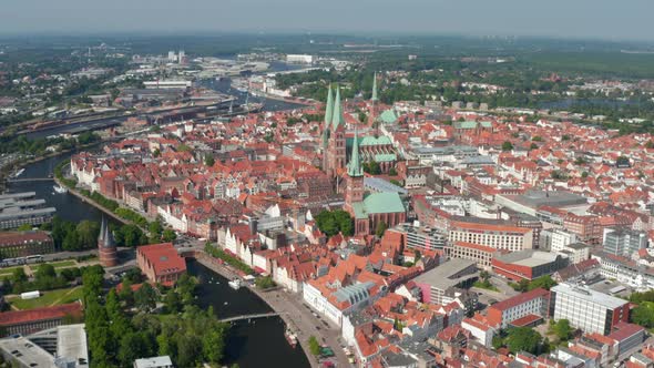 Aerial Panoramic View of Medieval City Centre with Tall Churches Towers alt