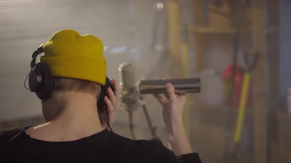 Unrecognizable Man Playing Shaker alt