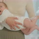 After the Morning Routine Mother Take Her Baby in - VideoHive Item for Sale