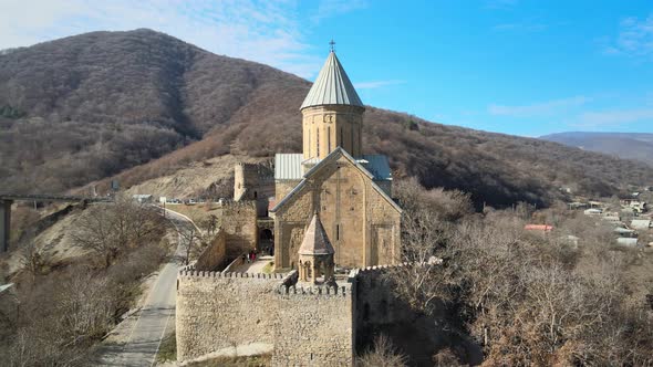 Aerial Flight Over Ananuri Castle Complex with Beautiful Town of Ananuri in Background