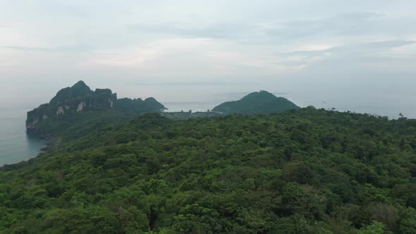 Panoramic Aerial View of Ocean Waters Forest And Clear Skies in Thailand alt