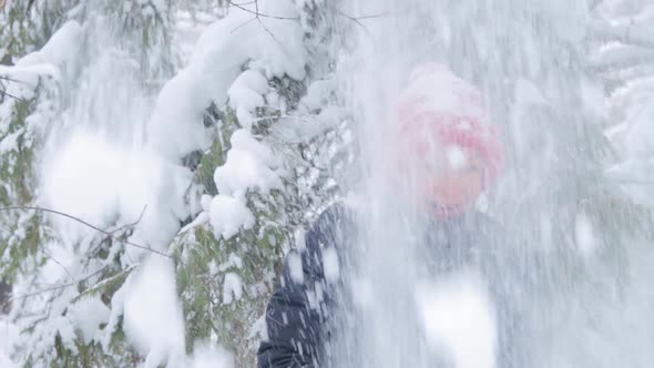 Snow falling on womans head