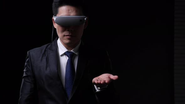 Businessman wearing VR glassese alt