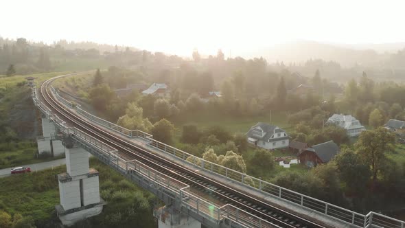 Picturesque Landscape with a View at Railway Bridge in Carapthian Countryside alt