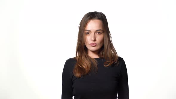 Pretty Woman with Long Hair is Holding Paper Packages in Her Hands alt