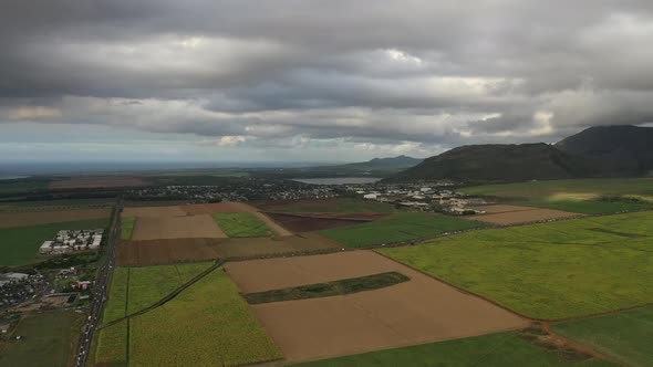Aerial Photography of the Beautiful Green Countryside of Mauritius with Fields and Mountain Views alt