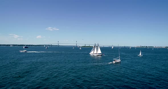Sailboats entering and leaving Mt. Hope Bay in Newport Rhode Island as well as returning from Block alt