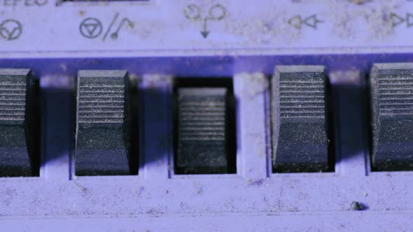 Finger Pressing Some Dusty Buttons alt