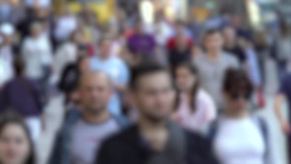 Silhouettes of People Walking in a Crowd Slow Motion alt