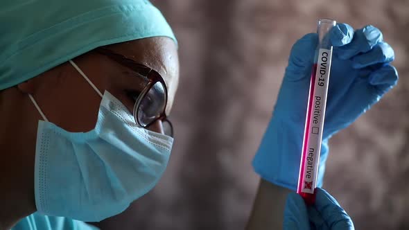 Doctor hands holding a coronavirus COVID-19 negative test tube