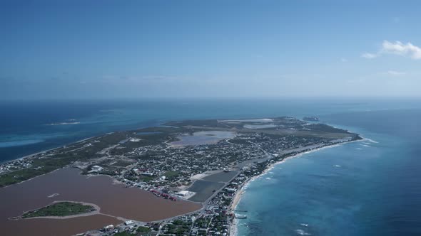 Aerial drone view of saline lake and Cockburn Town, Grand Turk, Turks and Caicos alt